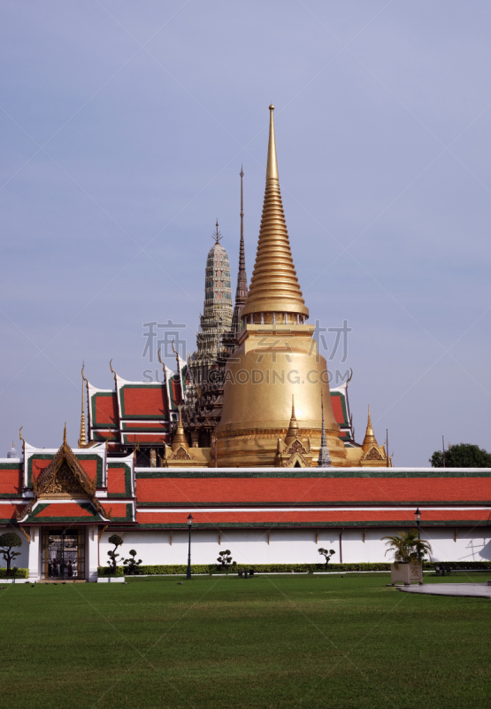 View of the great royal palace in Bangkok. Gilded spiers of Buddhist monasteries.